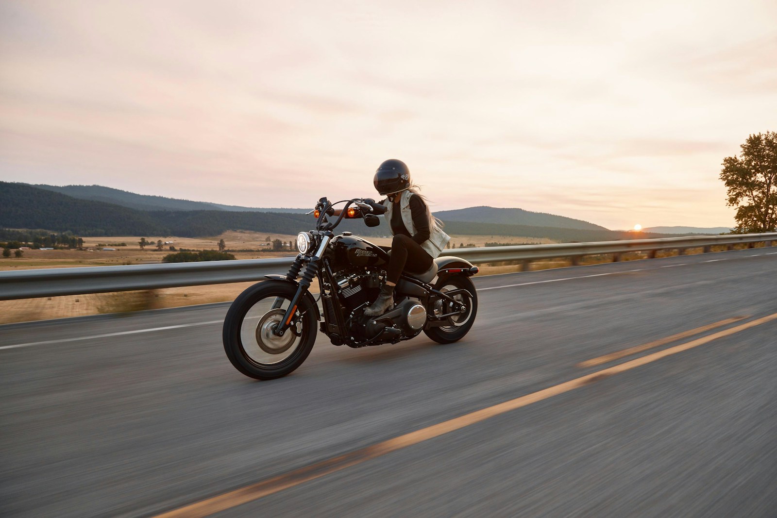 man on black cruiser motorcycle in highway, motorycle